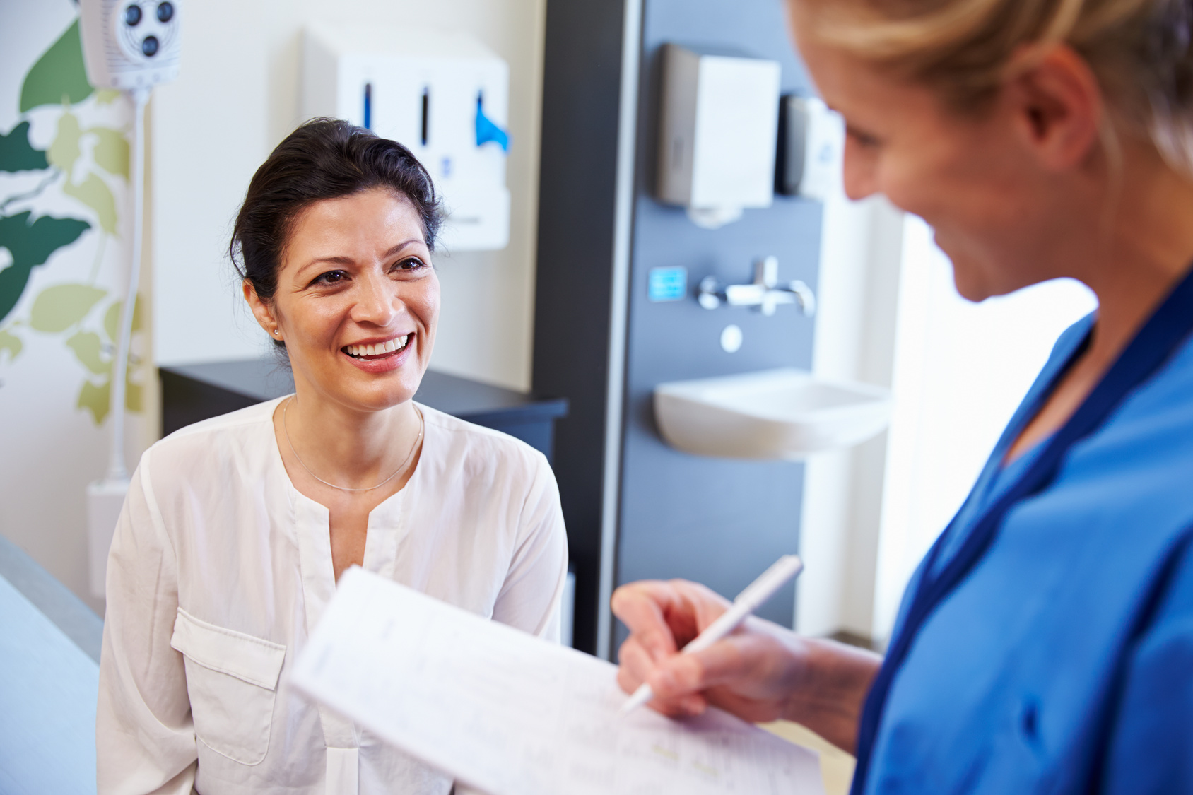 Doctor and female patient talking