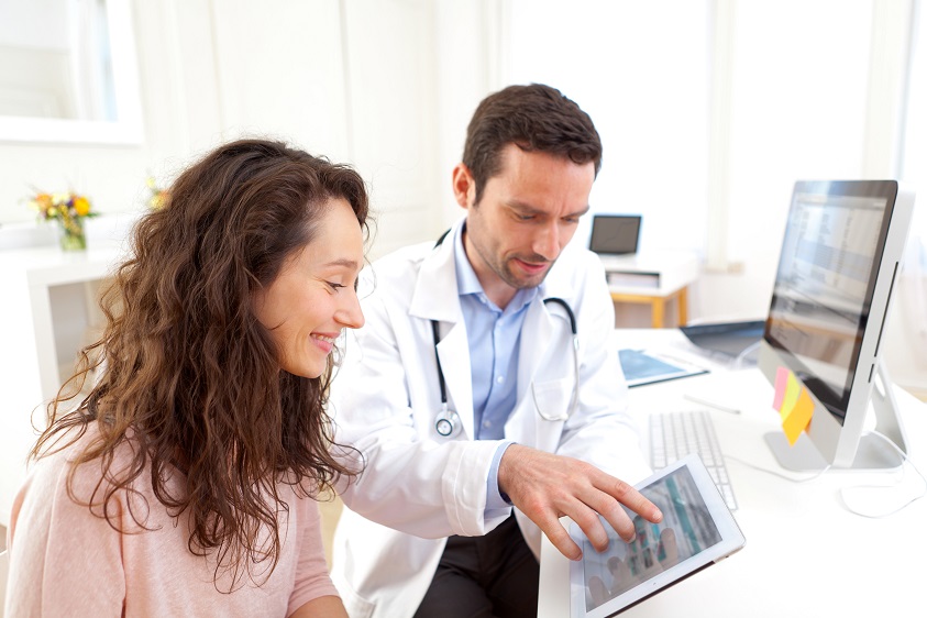 Doctor and patient with tablet