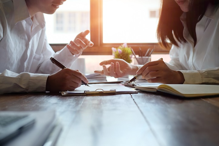 Two people in business meeting
